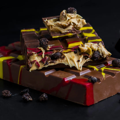 ChatGPT said:  Luxury Pink Pop Chocolate Bar – White Chocolate with Pistachio & Crunch